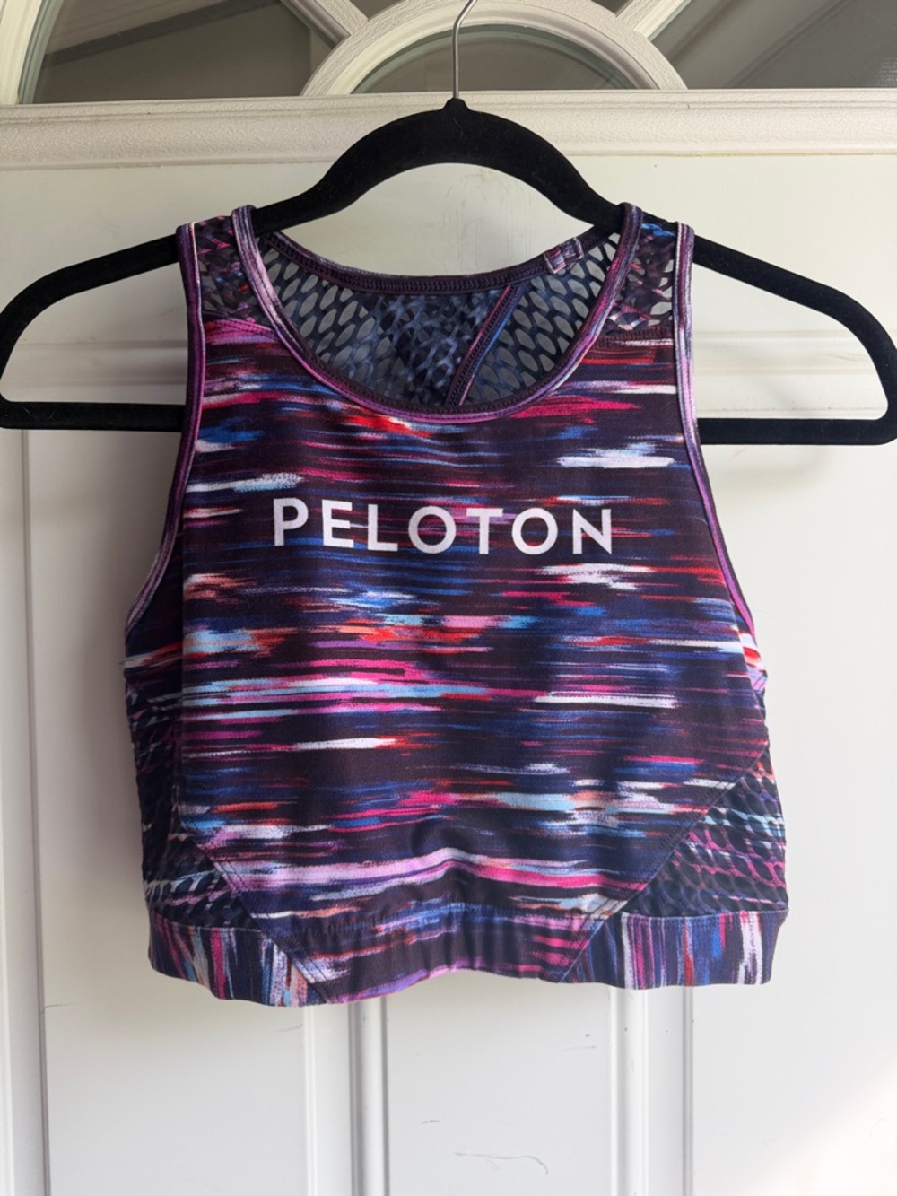 Peloton WITH brand purple multi-color sports bra, large.
